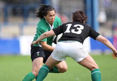 01.08.10.. Wales Women v Ireland Women, Women's Rugby World Cup 2010 Warm-Up Fixture -  Wales' Naomi Thomas takes on Jo O'Sullivan 