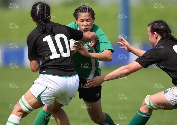 01.08.10.. Wales Women v Ireland Women, Women's Rugby World Cup 2010 Warm-Up Fixture -  Wales' Naomi Thomas is tackled by Ireland's Tania Rosser (lt) and Sinead Ryan  