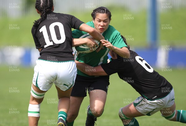 01.08.10.. Wales Women v Ireland Women, Women's Rugby World Cup 2010 Warm-Up Fixture -  Wales' Naomi Thomas is tackled by Ireland's Tania Rosser (lt) and Sinead Ryan  