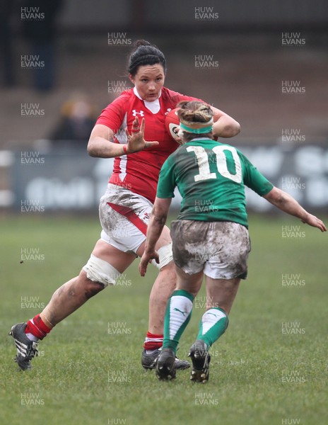 030213 - Wales Women v Ireland Women, 2013 RBS Womens 6 Nations, Aberavon - Wales' Vicky Owens holds off Ireland's Lynne Cantwell 