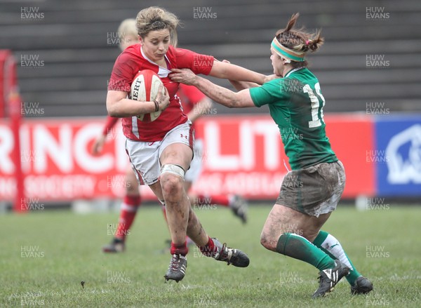 030213 - Wales Women v Ireland Women, 2013 RBS Womens 6 Nations, Aberavon - Wales' Sioned Harries holds off Ireland's Lynne Cantwell 