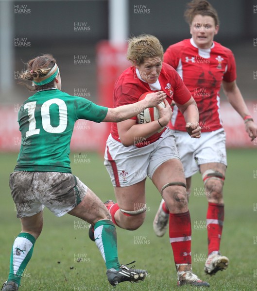 030213 - Wales Women v Ireland Women, 2013 RBS Womens 6 Nations, Aberavon - Wales' Gemma Hallett takes on Ireland's Lynne Cantwell 