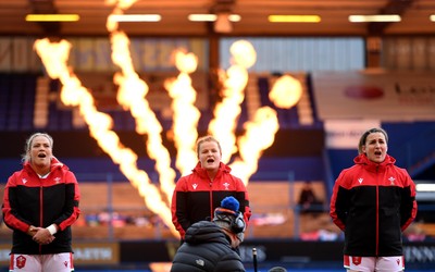 100421 - Wales Women v Ireland Women - Women's Six Nations - Kelsey Jones, Cara Hope and Siwan Lillicrap of Wales during the anthems