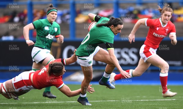 100421 - Wales Women v Ireland Women - Women's Six Nations - Hannah Tyrrell of Ireland is tackled by Natalia John of Wales