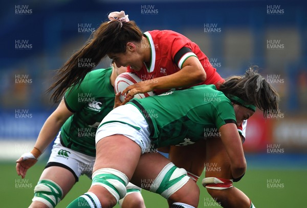 100421 - Wales Women v Ireland Women - Women's Six Nations - Georgia Evans of Wales is tackled by Nichola Fryday of Ireland