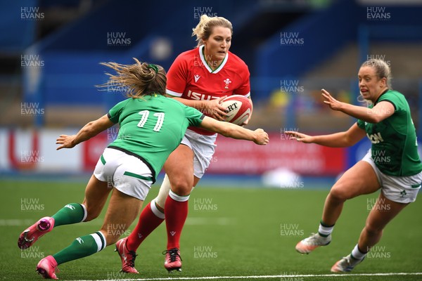 100421 - Wales Women v Ireland Women - Women's Six Nations - Teleri Wyn Davies of Wales is tackled by Beibhinn Parsons of Ireland
