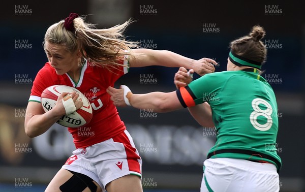 100421 - Wales Women v Ireland Women - Women's 2021 Six Nations Pool B - Hannah Jones of Wales is tackled by Ciara Griffin of Ireland