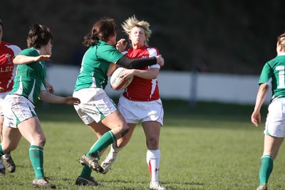13.03.11 Wales Women v Ireland Women ... Wales Mared Evans is halted by Fiona Coghlan. 