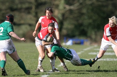 13.03.11 Wales Women v Ireland Women ... Wales Caryl James is tackled by Lynne Cantwell. 