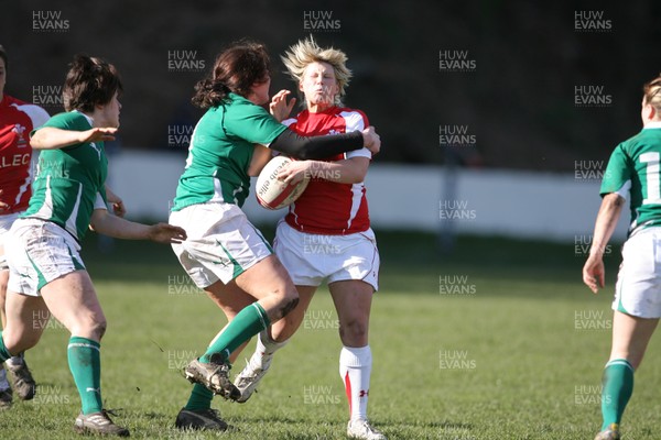 13.03.11 Wales Women v Ireland Women ... Wales Mared Evans is halted by Fiona Coghlan. 