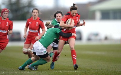 150315 - Wales Women v Ireland Women - RBS Womens 6 Nations 2015 -Laurie Harries of Wales is tackled by Alison Miller and Paula Fitzpatrick of Ireland