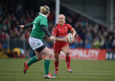 150315 - Wales Women v Ireland Women - RBS Womens 6 Nations 2015 -Adi Taviner of Wales is tackled by Niamh Briggs of Ireland