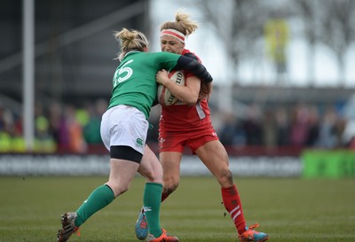 150315 - Wales Women v Ireland Women - RBS Womens 6 Nations 2015 -Adi Taviner of Wales is tackled by Niamh Briggs of Ireland