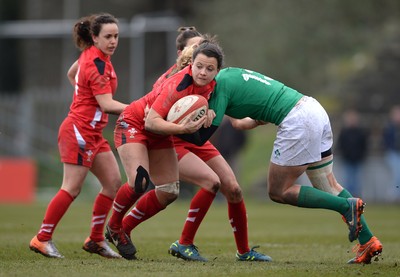 150315 - Wales Women v Ireland Women - RBS Womens 6 Nations 2015 -Sian Williams of Wales is tackled by Jenny Murphy of Ireland