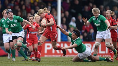 150315 - Wales Women v Ireland Women - RBS Womens 6 Nations 2015 -Rachel Taylor of Wales gets away from Sophie Spence of Ireland