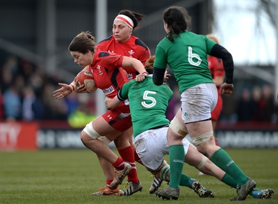 150315 - Wales Women v Ireland Women - RBS Womens 6 Nations 2015 -Sioned Harries of Wales is tackled by Marie Louise Reilly of Ireland