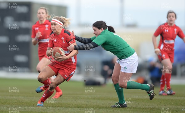 150315 - Wales Women v Ireland Women - RBS Womens 6 Nations 2015 -Adi Taviner of Wales is tackled by Jackie Shiels of Ireland