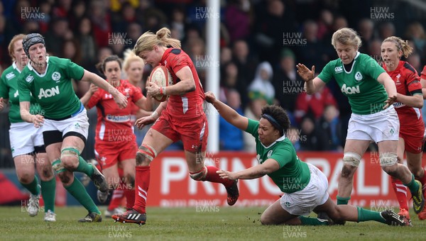 150315 - Wales Women v Ireland Women - RBS Womens 6 Nations 2015 -Rachel Taylor of Wales gets away from Sophie Spence of Ireland