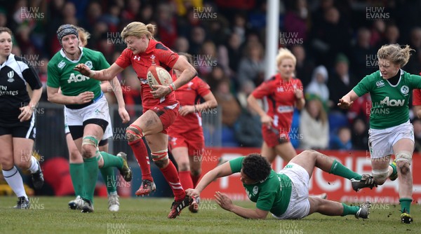 150315 - Wales Women v Ireland Women - RBS Womens 6 Nations 2015 -Rachel Taylor of Wales gets away from Sophie Spence of Ireland