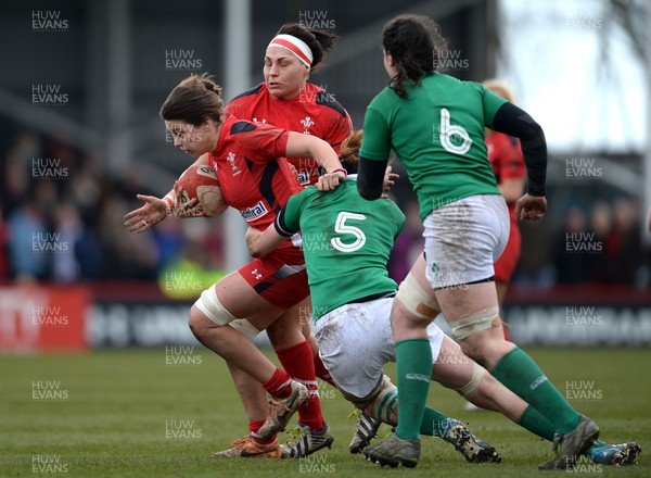 150315 - Wales Women v Ireland Women - RBS Womens 6 Nations 2015 -Sioned Harries of Wales is tackled by Marie Louise Reilly of Ireland