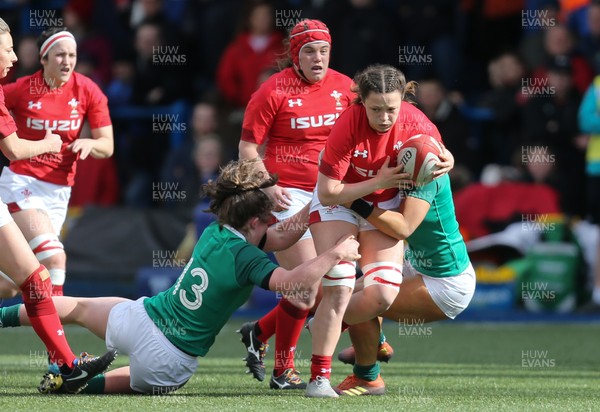 170319 - Wales v Ireland, Women's Six Nations 2019 - Alisha Butchers of Wales looks for support as sh is tackled