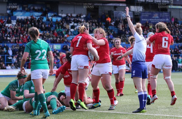 170319 - Wales v Ireland, Women's Six Nations 2019 - Wales players celebrate with Siwan Lillicrap of Wales after she scores try