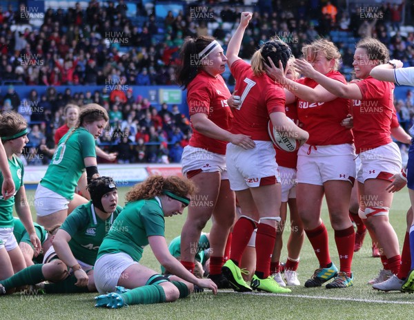 170319 - Wales v Ireland, Women's Six Nations 2019 - Wales players celebrate with Siwan Lillicrap of Wales after she scores try