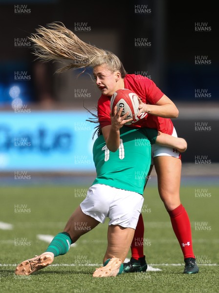 170319 - Wales v Ireland, Women's Six Nations 2019 - Hannah Jones of Wales is tackled by Beibhinn Parsons of Ireland