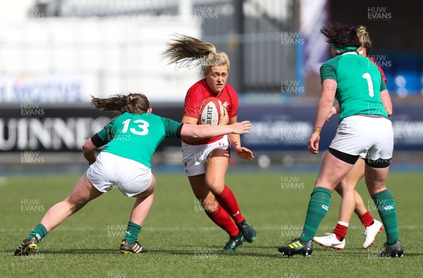 170319 - Wales v Ireland, Women's Six Nations 2019 - Hannah Jones of Wales takes on Enya Breen of Ireland