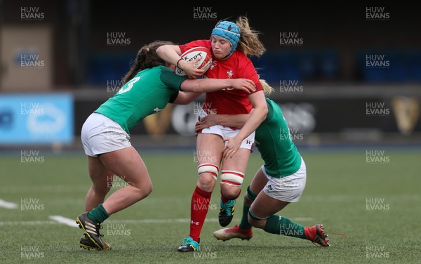 170319 - Wales v Ireland, Women's Six Nations 2019 - Gwen Crabb of Wales takes on Claire Molloy of Ireland and Enya Breen of Ireland