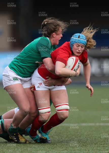 170319 - Wales v Ireland, Women's Six Nations 2019 - Gwen Crabb of Wales takes on Claire Molloy of Ireland and Enya Breen of Ireland