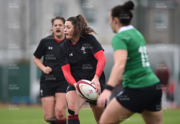210118 - Wales Women v Ireland Women - Robyn Wilkins of Wales gets the ball away