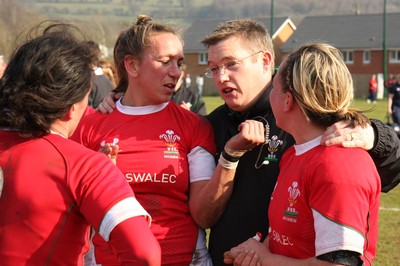 21.03.09 Wales vs. Ireland. Women's 6 Nations. Coach Jason Lewis(C) congratulates(L-R) Mel Berry, Clare Flowers & Rhian Bowden. 