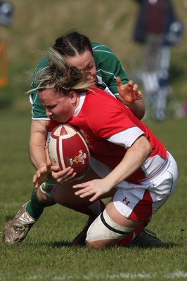 21.03.09 Wales vs. Ireland. Women's 6 Nations. Rhian Bowden is tackled by Sinead Ryan. 