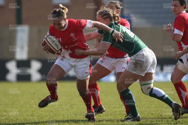 21.03.09 Wales vs. Ireland. Women's 6 Nations. Clare Flowers tries to escape the tackle of Shannon Houston. 