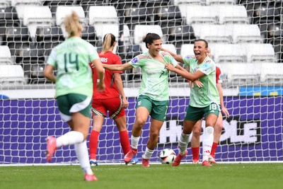 030625 - Wales Women v Italy Women - UEFA Women's Nations League - Sofia Cantore of Italy Women celebrates scoring a goal with team mates