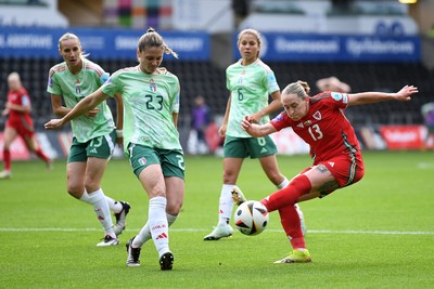 030625 - Wales Women v Italy Women - UEFA Women's Nations League - Rachel Rowe of Wales Women has a shot at goal