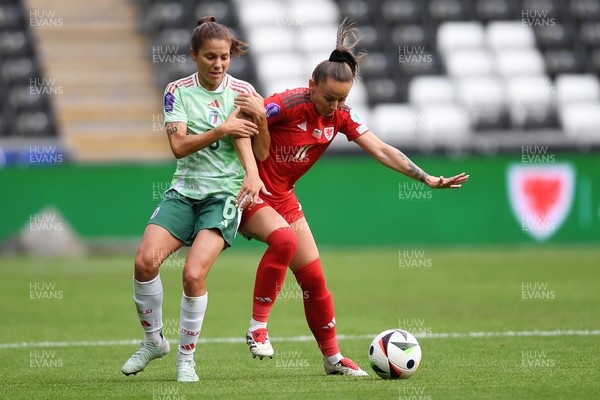 030625 - Wales Women v Italy Women - UEFA Women's Nations League - Hannah Cain of Wales Women  is challenged by Manuela Giugliano of Italy Women