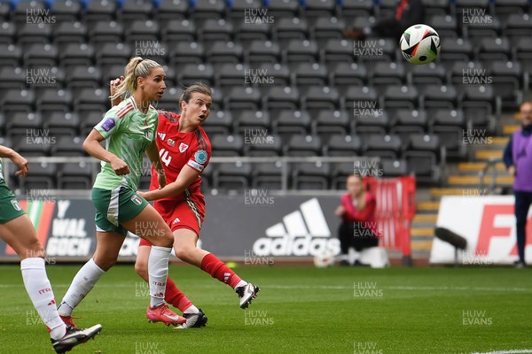 030625 - Wales Women v Italy Women - UEFA Women's Nations League - Hayley Ladd of Wales Women heads on goal