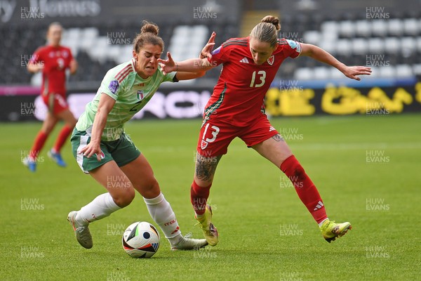 030625 - Wales Women v Italy Women - UEFA Women's Nations League - Rachel Rowe of Wales Women is challenged by Valentina Bergamaschi of Italy Women