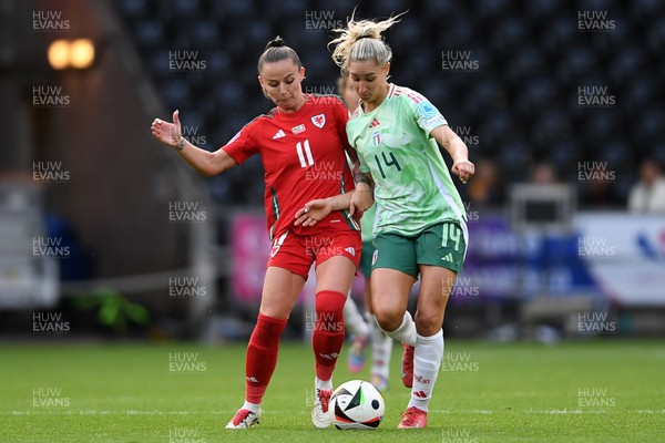 030625 - Wales Women v Italy Women - UEFA Women's Nations League - Hannah Cain of Wales Women is challenged by Chiara Beccari of Italy Women