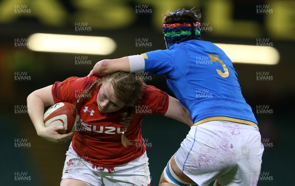110318 - Wales Women v Italy Women - Natwest 6 Nations Championship - Caryl Thomas of Wales is tackled by Giordana Duca of Italy