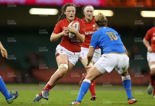 110318 - Wales Women v Italy Women - Natwest 6 Nations Championship - Alisha Butchers of Wales is tackled by Veronica Madia of Italy