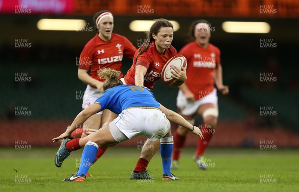 110318 - Wales Women v Italy Women - Natwest 6 Nations Championship - Alisha Butchers of Wales is tackled by Veronica Madia of Italy