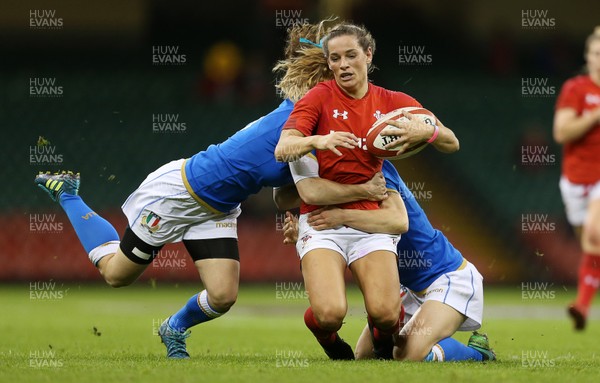 110318 - Wales Women v Italy Women - Natwest 6 Nations Championship - Kerin Lake of Wales is tackled by Aura Muzzo and Sara Barattin of Italy