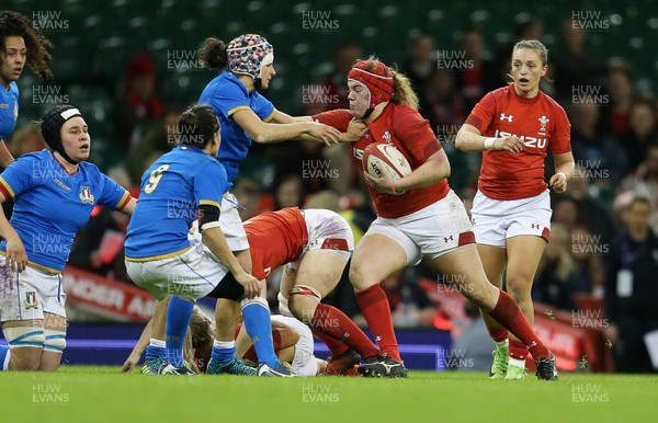 110318 - Wales Women v Italy Women - Natwest 6 Nations Championship - Carys Philips of Wales is tackled by Michela Sillarri of Italy