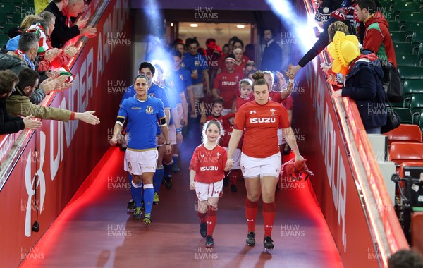 110318 - Wales Women v Italy Women - Natwest 6 Nations Championship - Carys Philips of Wales runs out the mascot