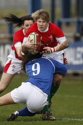 21.03.10 Wales v Italy - Womens' 6 Nations Championship - Wales' Mared Evans is tackled by Italy's Schiavon Valentina. 