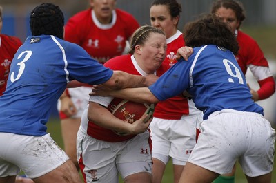 21.03.10 Wales v Italy - Womens' 6 Nations Championship - Wales' Rhian Bowden charges at Italy's Gai Lucia(3) & Schiavon Valentina. 
