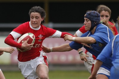 21.03.10 Wales v Italy - Womens' 6 Nations Championship - Wales' Mel Berry hands off Italy's Severin Flavia. 